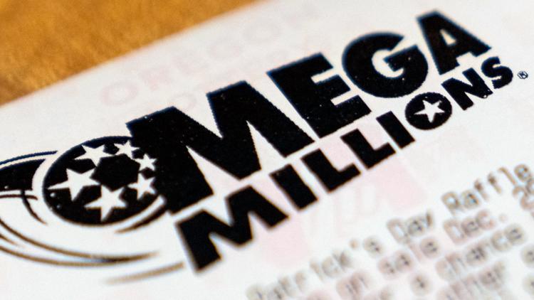 A family gathers around a table, excitedly checking Mega Millions lottery tickets.